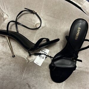 Express black heels w black velvety strap at the foot, ankle, Gold stiletto heel